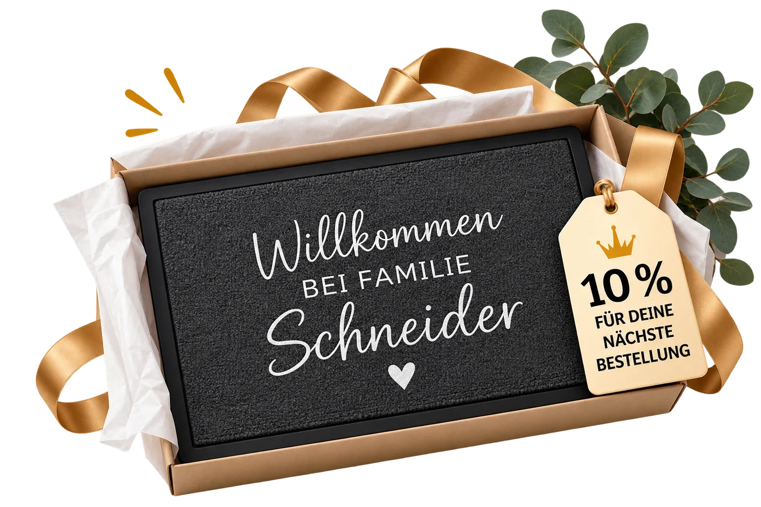Personalisierte Fußmatte „Willkommen bei Familie Schneider“ in einer goldenen Geschenkbox mit Anhänger „10 % für deine nächste Bestellung“